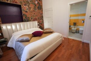Zona letto Suite Gialla Rosetta burger queen luxury room cagliari