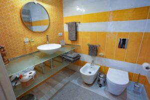 Zona bagno suite giall Rosetta burger queen luxury room cagliari